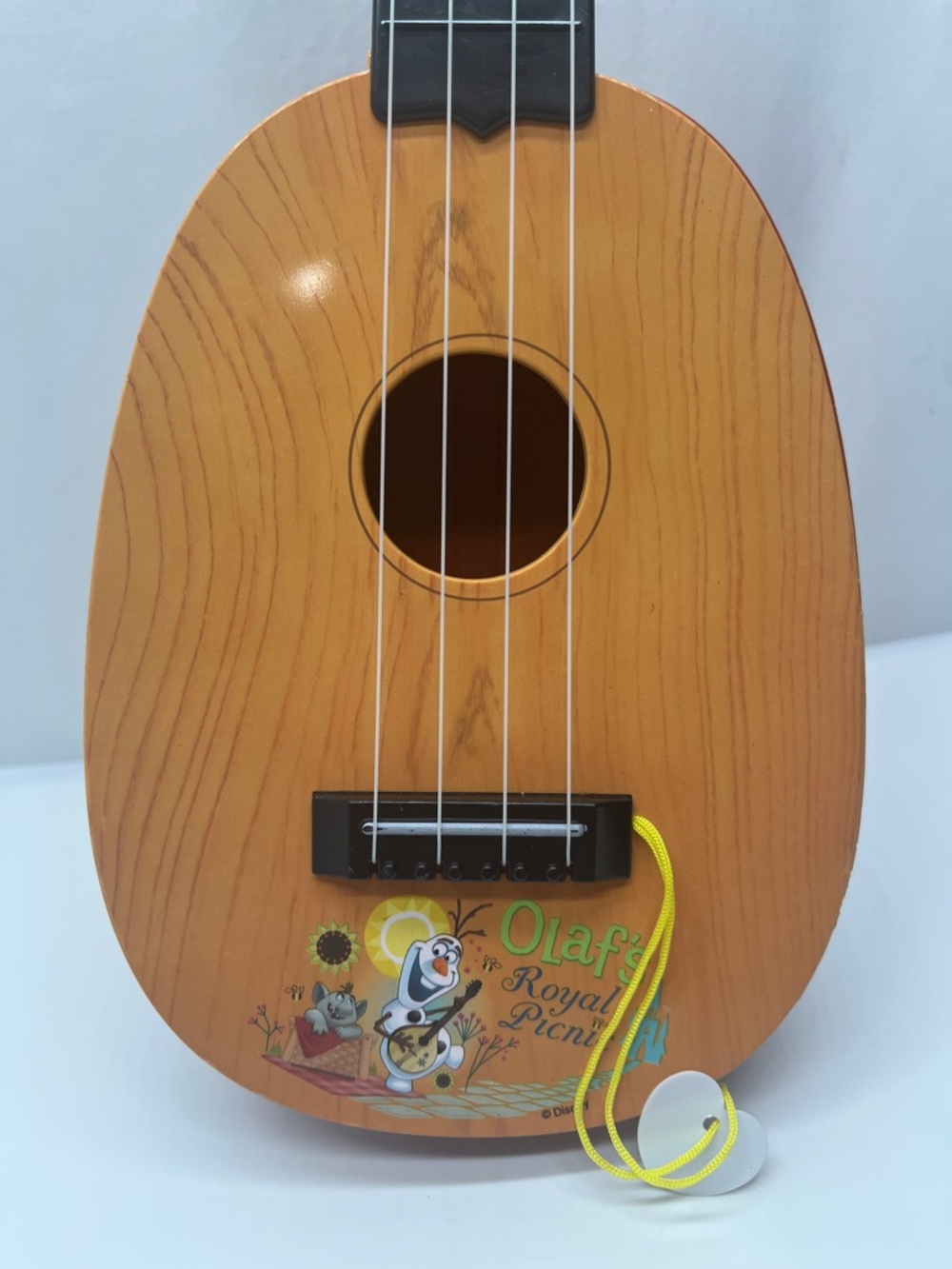 Disney Olaf Wooden Look Orange and Black Kids Ukulele Toy - Picture 2 of 6